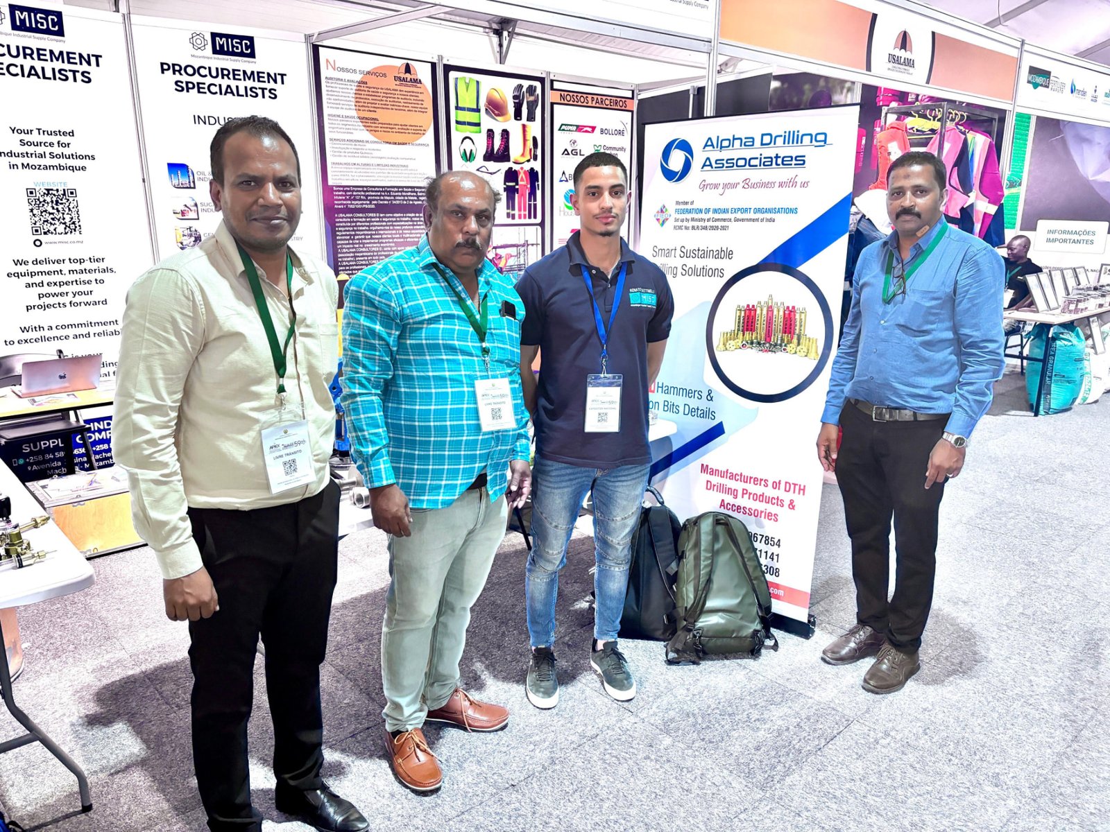 Alpha Drilling Associates representatives at an exhibition
